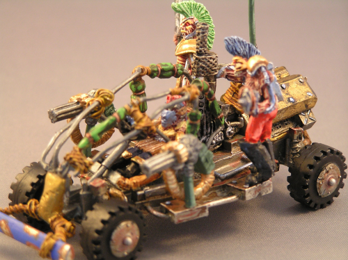 Cage car with 3 Mohawk riders